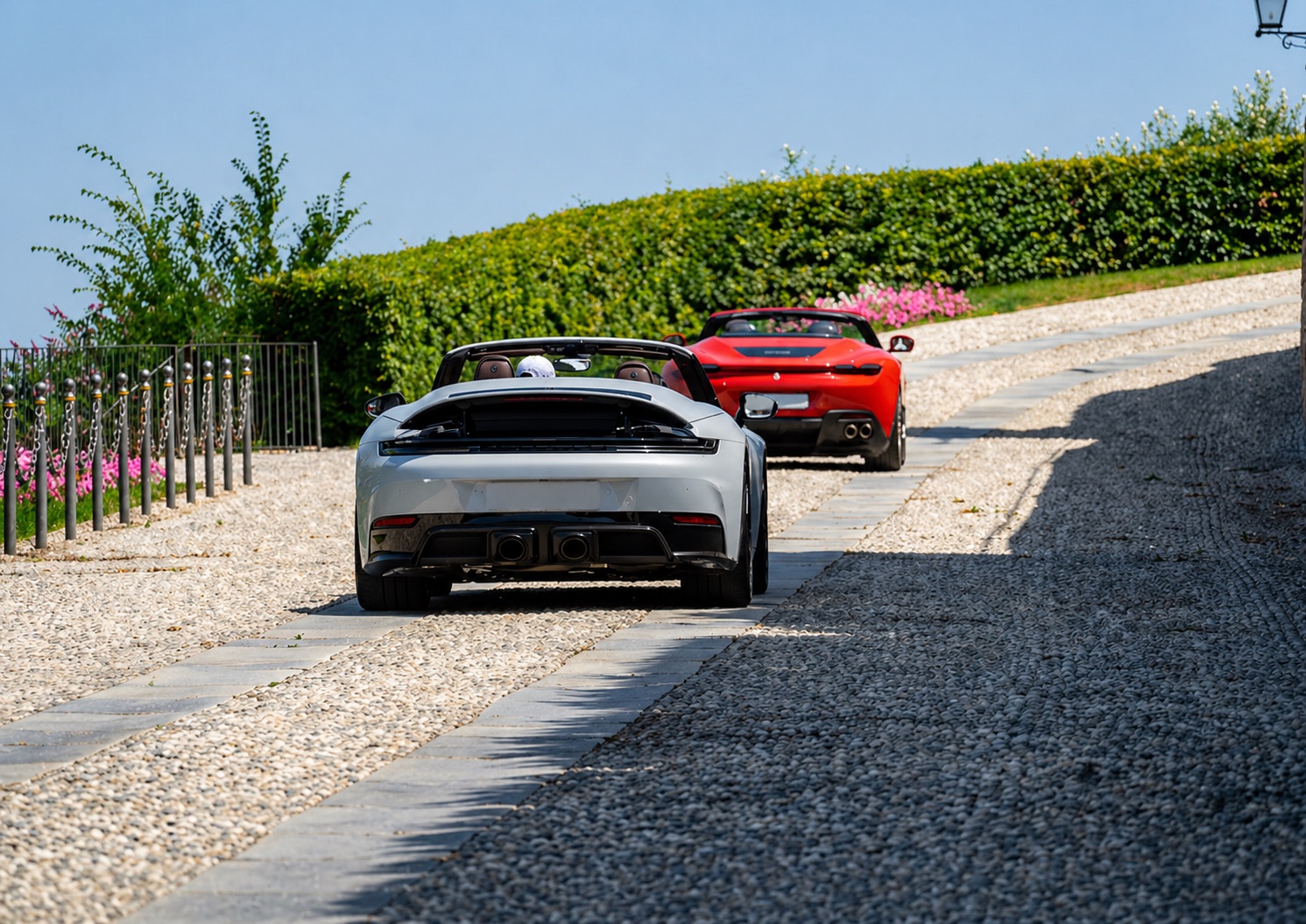 Supercars arriving at a Tuscan estate